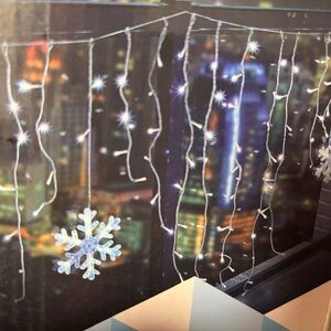 Noma Twinkling Curtain Lights with Snowflake Accents